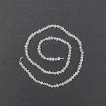 Freshwater oval pearls on a thread, diameter 6x5 mm, length 35 cm