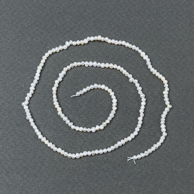 Freshwater pearls on a thread, 2×1.5 mm, 39 cm