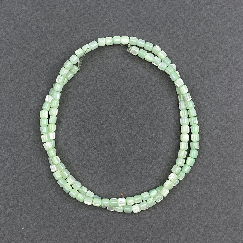 Mint-Tinted Mother-of-Pearl Beads Cylindrical, 3.5x3.5 mm, length about 40 cm on beading thread