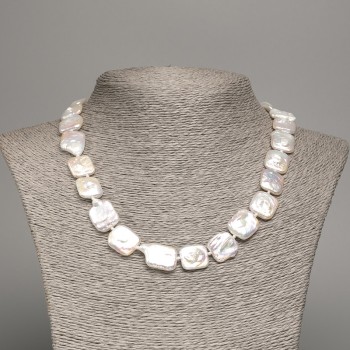 Necklace of natural baroque pearls with a gasoline shade