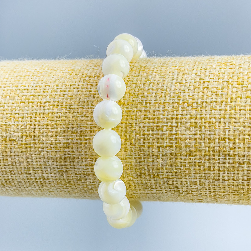 Bracelet White Mother-of-Pearl, smooth beads, 9mm diameter ±, length 18 cm (stretch)