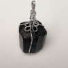 Pendant with natural Tourmaline Schorl, 27x16 mm +/- silver-tone setting, shape may vary