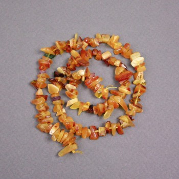 Amber chip beads on a string, diameter 8x3 mm +-, length 39 cm +