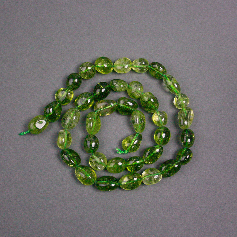 Olive crystal beads on thread, tinted to peridot, faceted oval beads, diameter 9×12 mm, length 40 cm