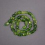 Olive crystal beads on thread, tinted to peridot, faceted oval beads, diameter 9×12 mm, length 40 cm