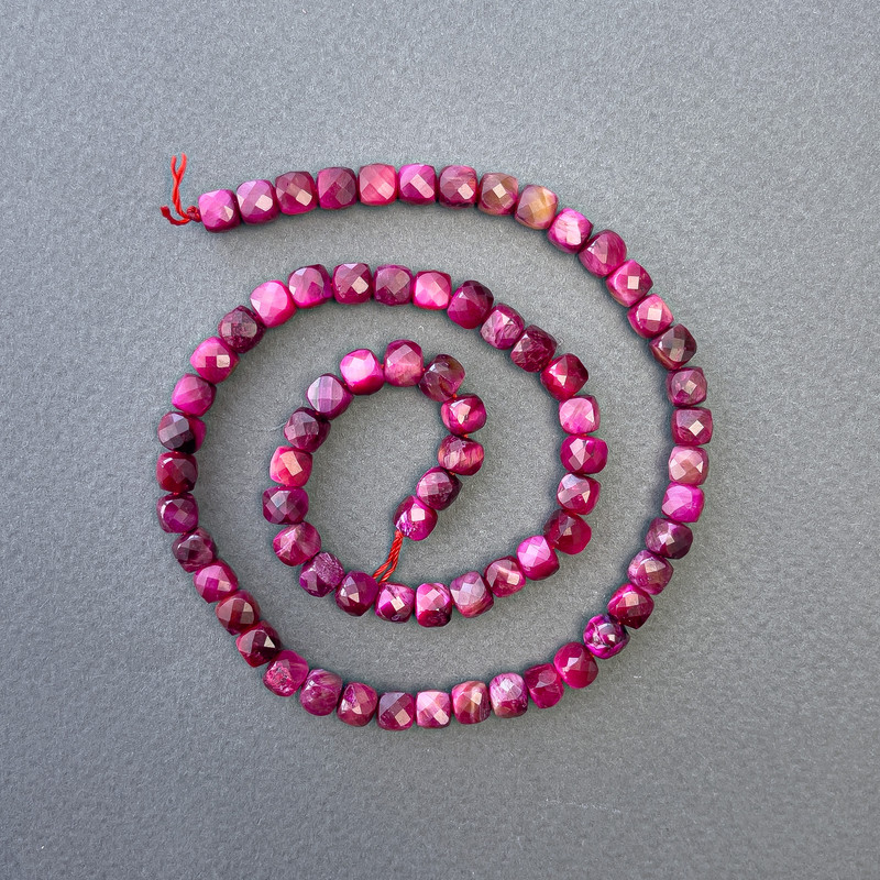 Beads of Raspberry Tiger's Eye, tinted natural stone, faceted cube, 5x5 mm, 39 cm strand