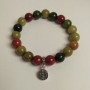 Assorted bracelet with natural stones, smooth beads, diameter about 10.5 mm, length 18 cm (stretch) with metal inserts