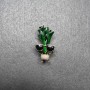 Brooch Celery in Glasses green, black and white enamel, golden metal 18x32mm
