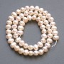 Freshwater round pearls on a string, diameter 6x5mm+-, length 35cm+