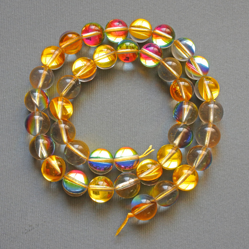Opal glass beads, yellow chameleon, smooth balls, 10 mm diameter, 38 cm length on thread