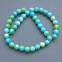Beads 'Variscite' (acrylic imitation) blue, white, and yellow smooth spheres, diameter 10 mm, length 39 cm +/- on a thread