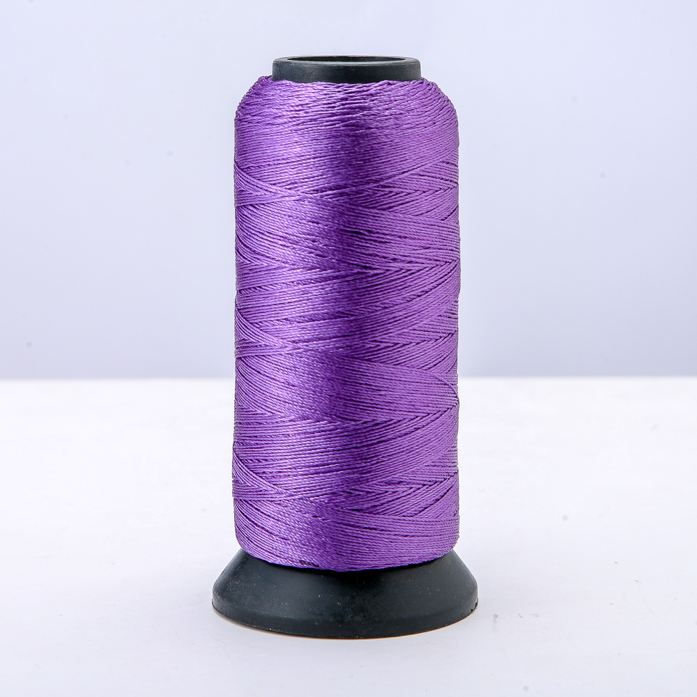 Purple nylon craft thread on a spool, diameter 0.9 mm