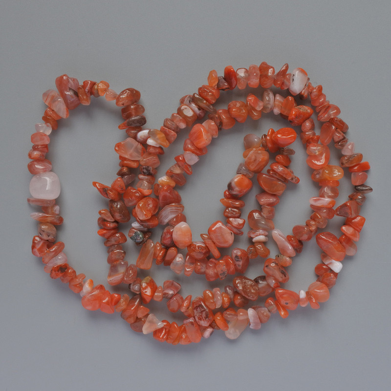 Carnelian beads, natural stone chip, 8x4 mm diameter +/-, length 78 cm +/- on monofilament