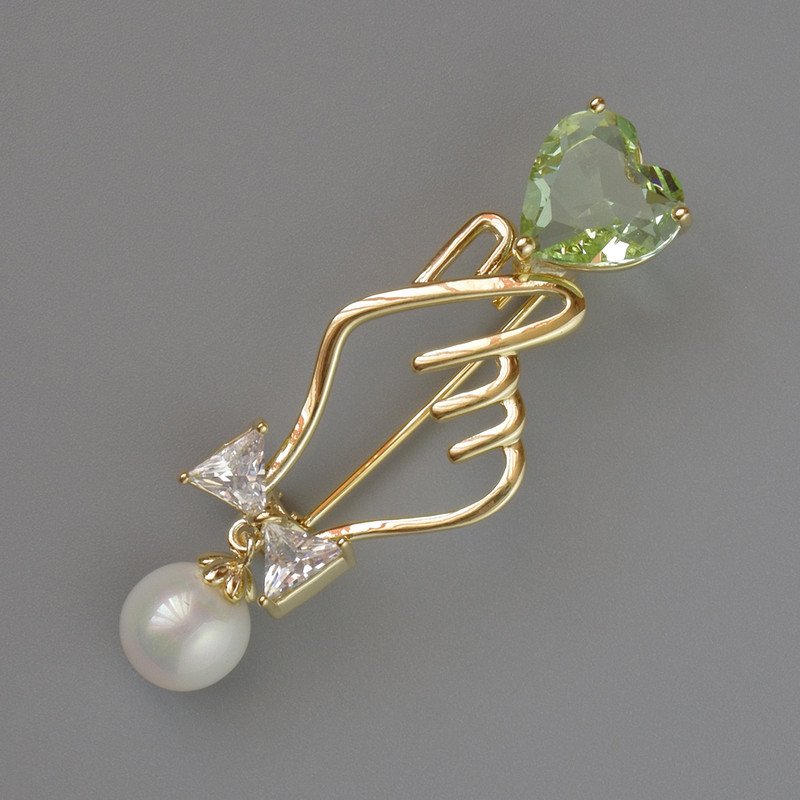 Brooch 'Symbol of Love' green and white crystals, white bead 45x16mm, gold-tone metal