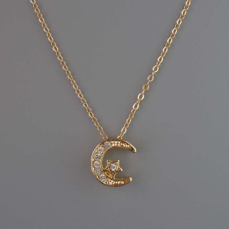 Pendant "Moon" on a goldentone chain, diameter 13x12 mm, thickness 1 mm + -, length 40-45 cm +