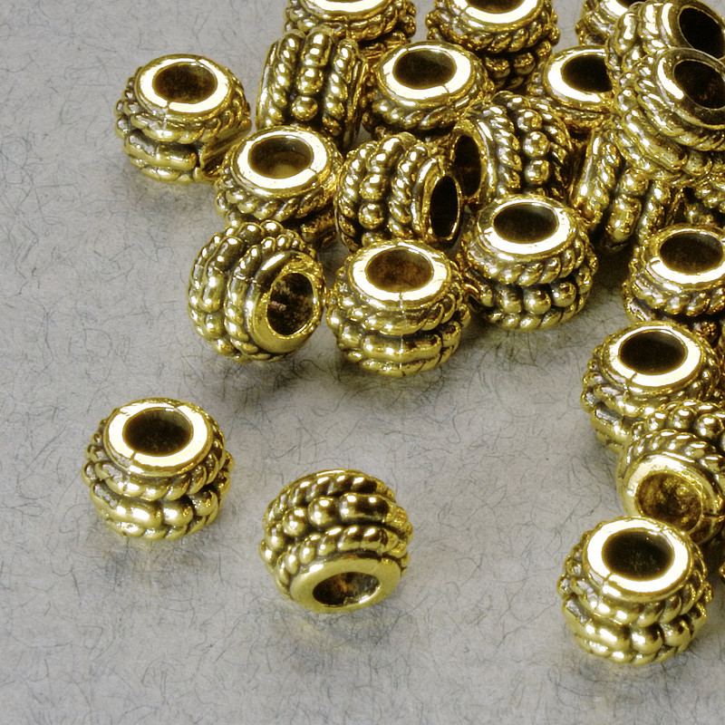 Gold-tone bead-insert, diameter 5×6.5 mm, hole diameter 2.8 mm, gold-colored metal, pack 20 g ± 38 pcs ±