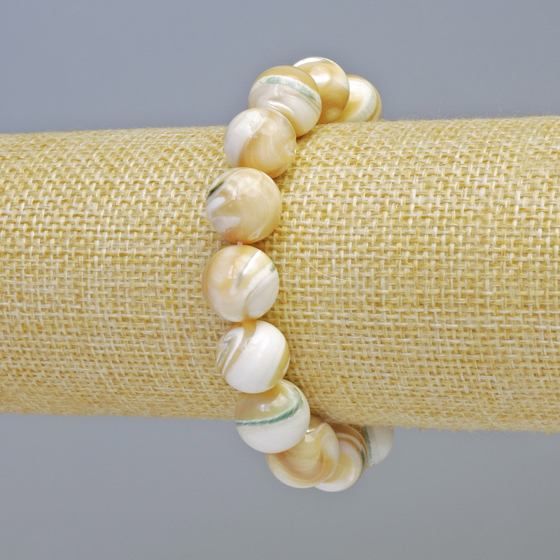 Bracelet with natural mother-of-pearl, smooth beads, 12 mm diameter ± (stretch), length 18 cm+