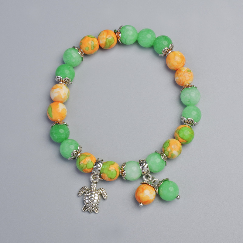 Bracelet 'Variscite' (synthetic acrylic) and Nephrite (synthetic), 8.5 mm diameter +/- (stretch), length 18 cm +/- with metal inserts