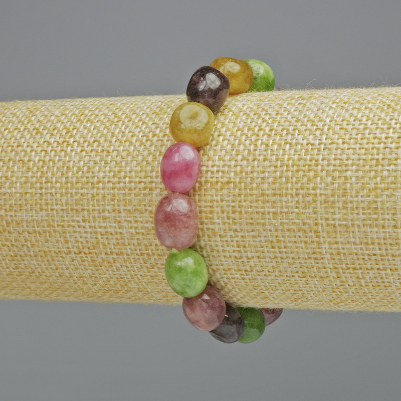 Bracelet 'Assortment' of natural stones, faceted, diameter 10x12 mm +/- (stretch), length 18 cm+