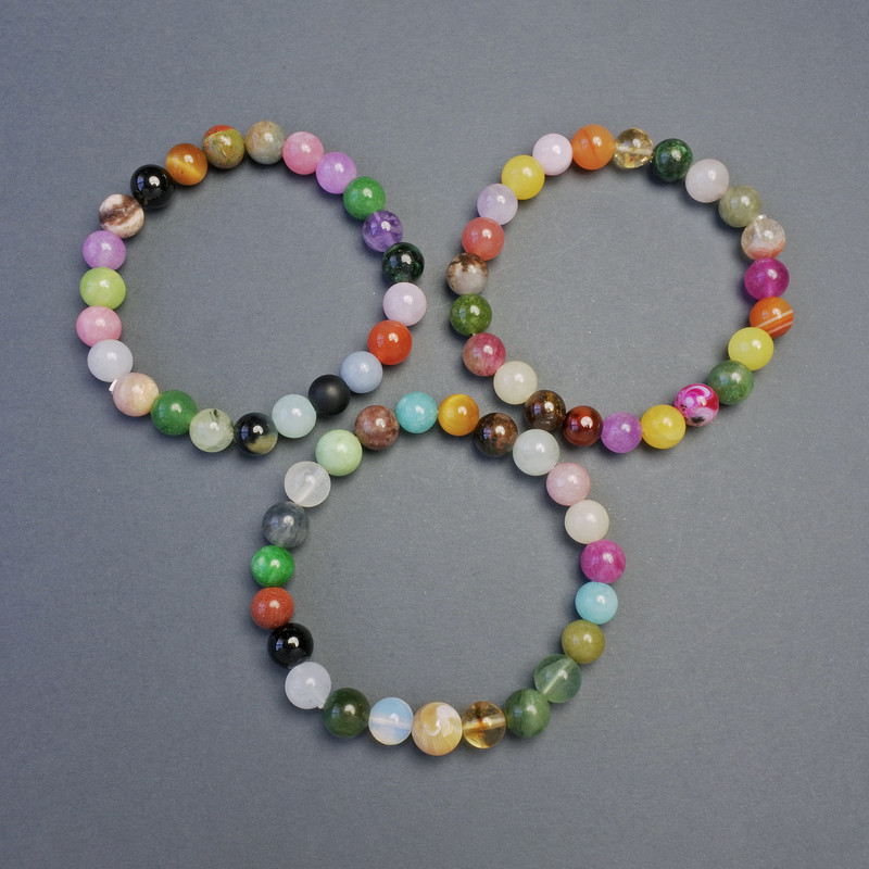 Bracelet with an assortment of stones, smooth beads, 8 mm diameter, 18 cm length, stretch