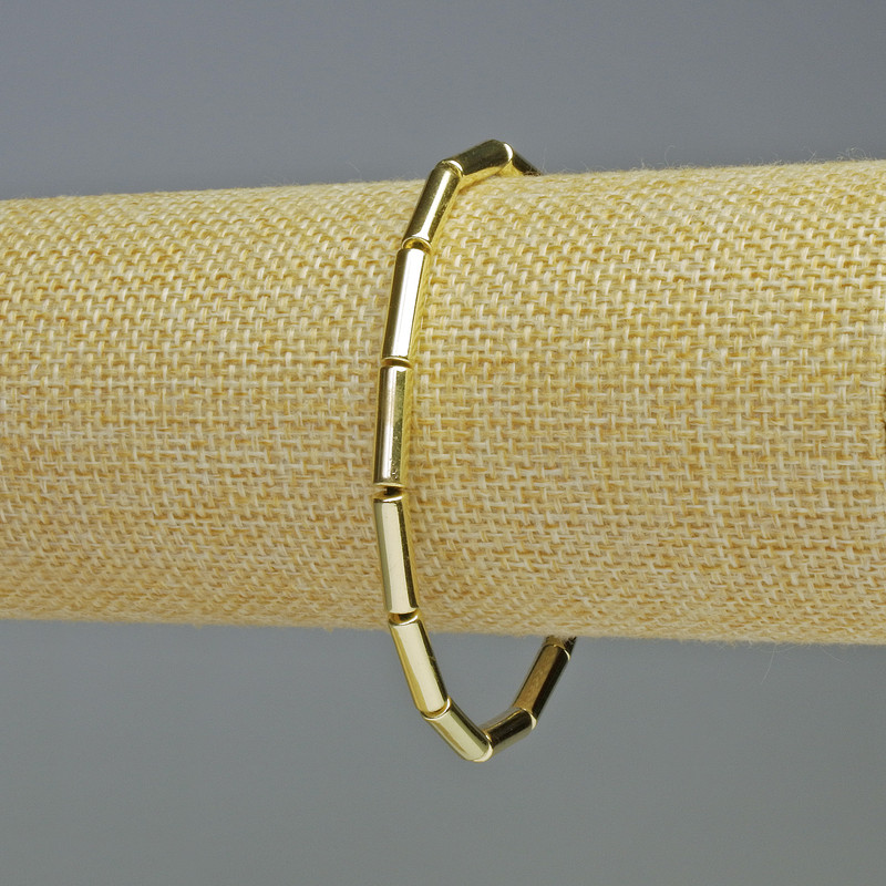 Hematite bracelet with cylindrical beads, light gold color, diameter 13×4 mm, length 18 cm, stretch