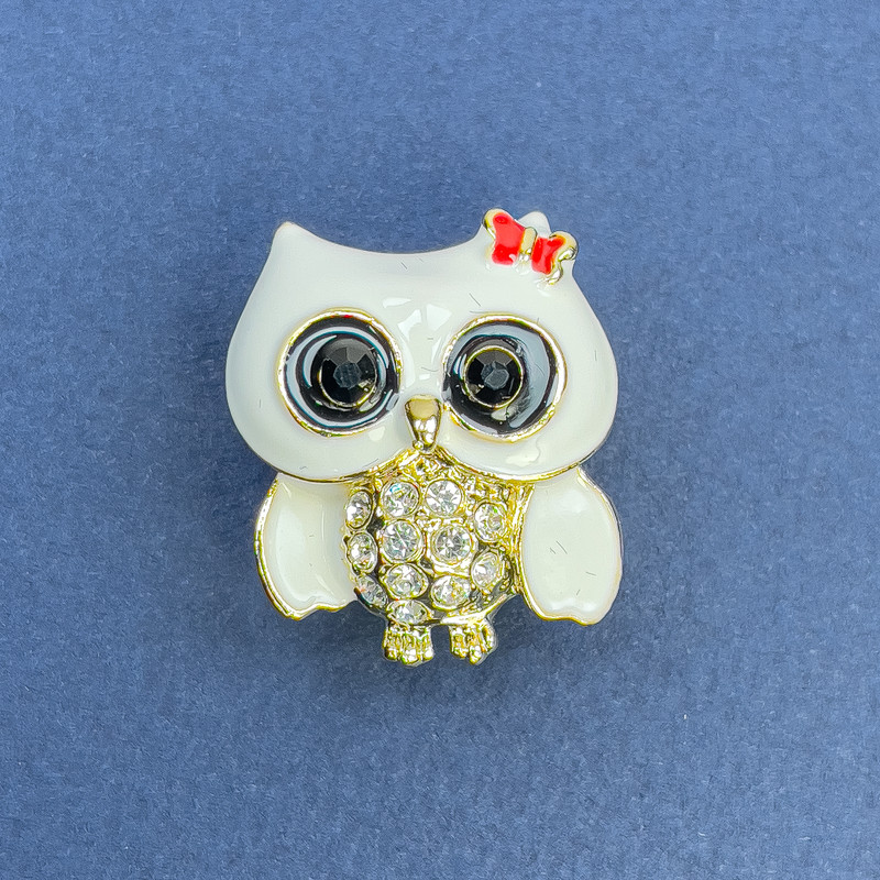 Brooch-pendant Owl with white crystals, white and black enamel, gold-tone metal, diameter 22 mm, length 26 mm