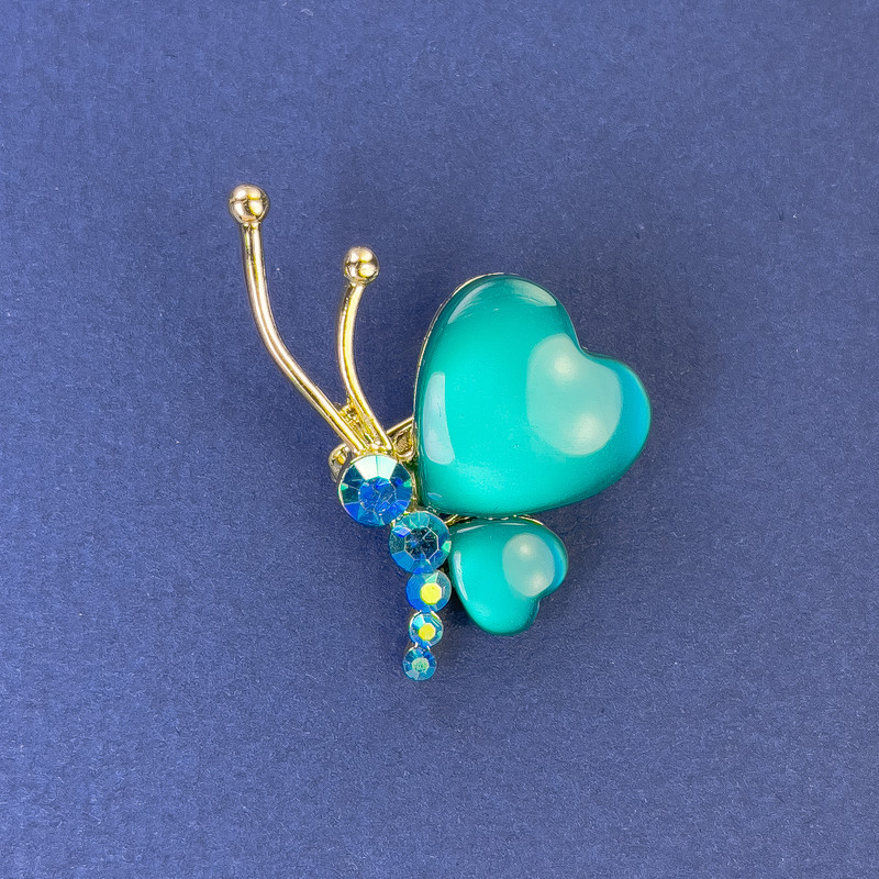 Brooch Butterfly, diameter 34×21 mm ± green cat's-eye crystals, gold-tone metal