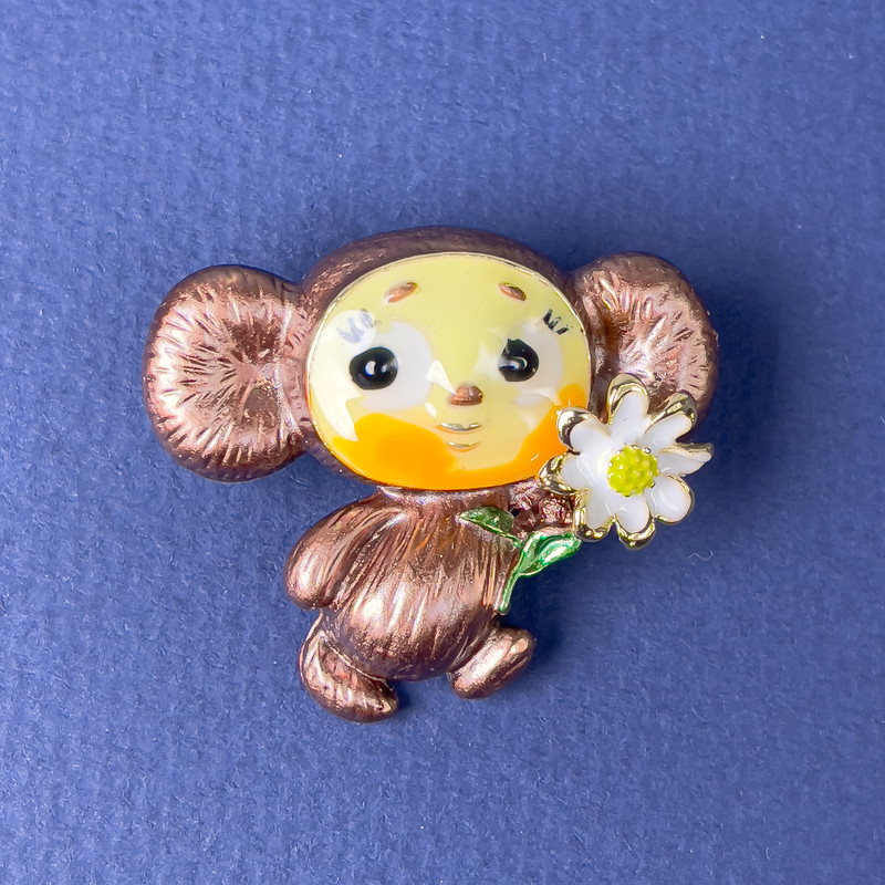 Brooch 'Cheburashka' with enamel and gold-tone metal, brown/yellow/white, 28×31 mm
