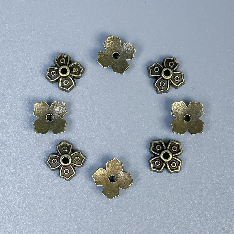 Bead caps for beads, bronze metal color, 7x1 mm, hole diameter ~1 mm, packaging 50 pcs