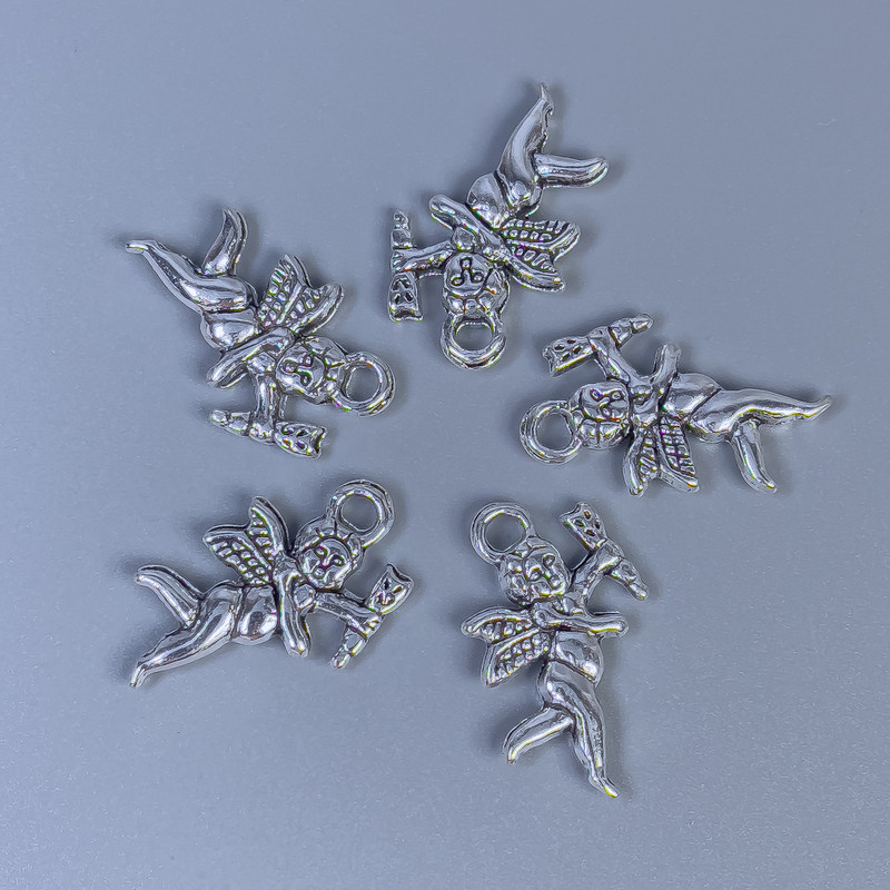 Фурнітура підвіска Купідон колір металу срібло, розміри 23х14х3мм+- отвір, діаметр 2, 5мм+- фасування 20гр. (~ 12шт. )