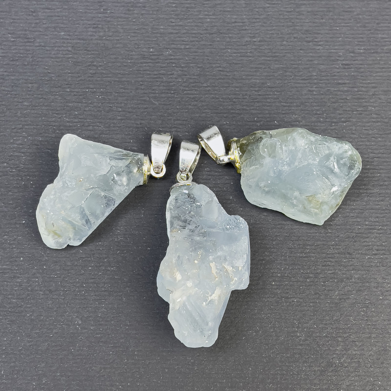 Raw Aquamarine Pendant, diameter ranging 31x16-37-18 mm; silver metal