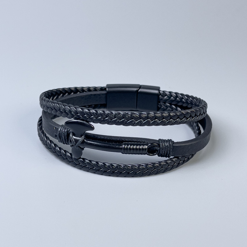 Men's bracelet in black eco-leather with metal inserts, thickness 10–22 mm, length 22 cm, black metal clasp