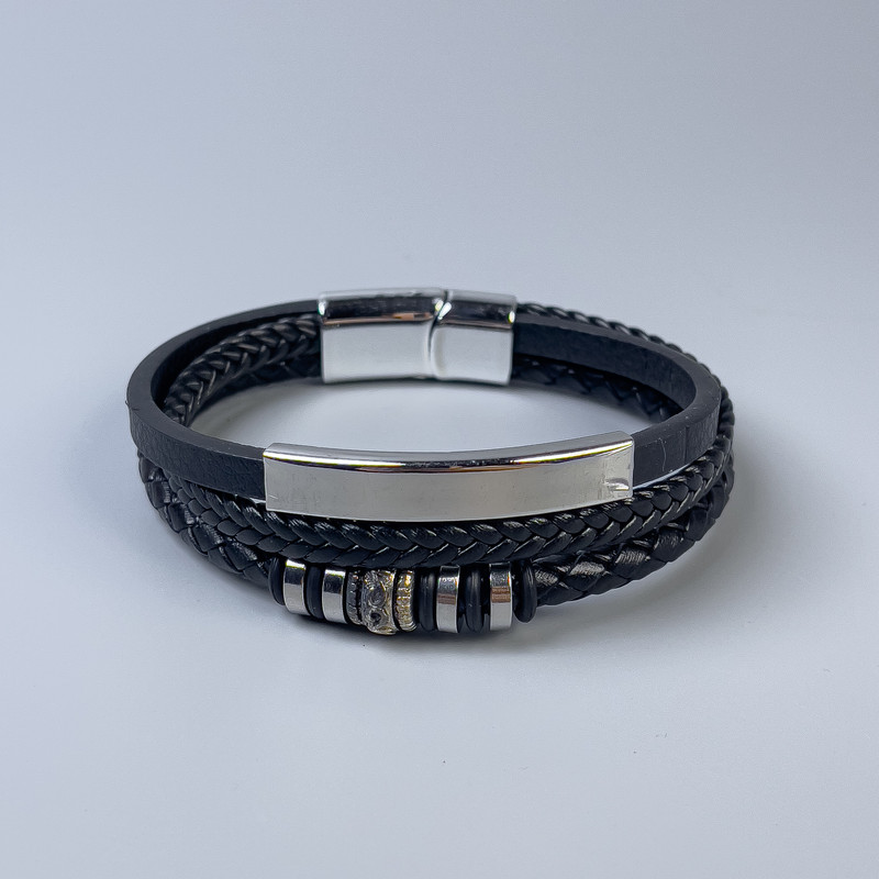 Men's bracelet in black eco-leather with metal inserts, thickness 11-25 mm +/-, length 22 cm +/-, silver-tone metal on the clasp