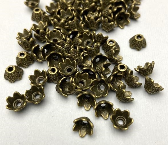 Bead cap findings bronze color, 7×1 mm diameter, hole approx. 2 mm, packaging (~32 pcs ±)