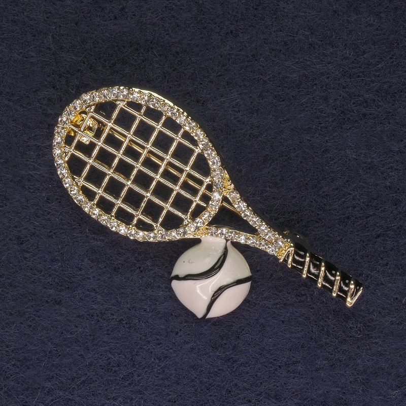 Brooch 'Racket with Ball' white crystals, gold-tone metal, diameter 44x22mm +