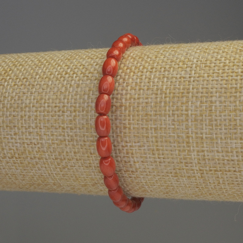 Orange Coral Barrel Bracelet, 6x5 mm diameter, 18 cm length, stretch
