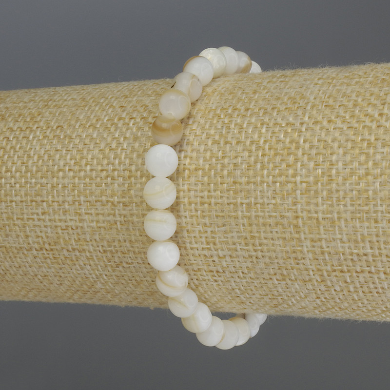 Stretch bracelet with smooth mother-of-pearl beads, 6 mm diameter, 18 cm length