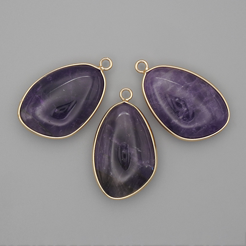 Amethyst pendant in a gold-tone bezel 21×35 mm+