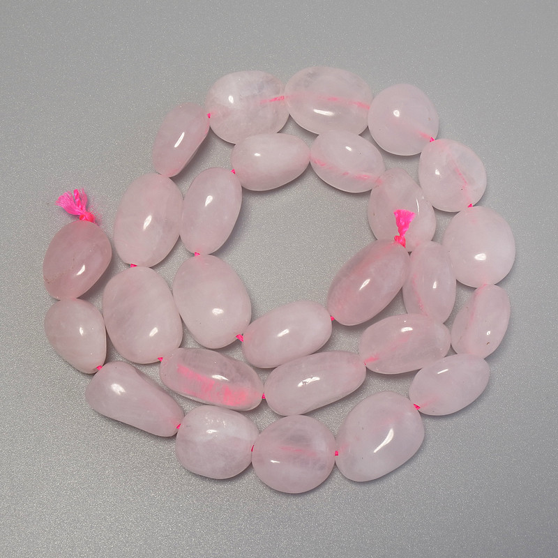 Rose Quartz Faceted Beads, diameter 12–19×12 mm ± on a thread, length 40 cm+