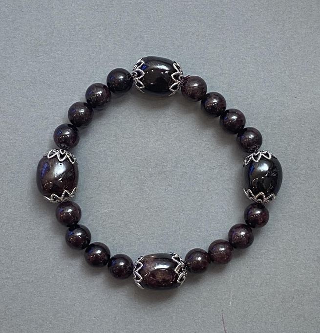 Garnet bead bracelet with metal inserts, 14x12 mm beads, 8 mm beads, length 18 cm (stretch)