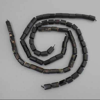 Tourmaline beads, polished stones, diameter 14–16×11–13 mm, on a thread, length 39 cm+