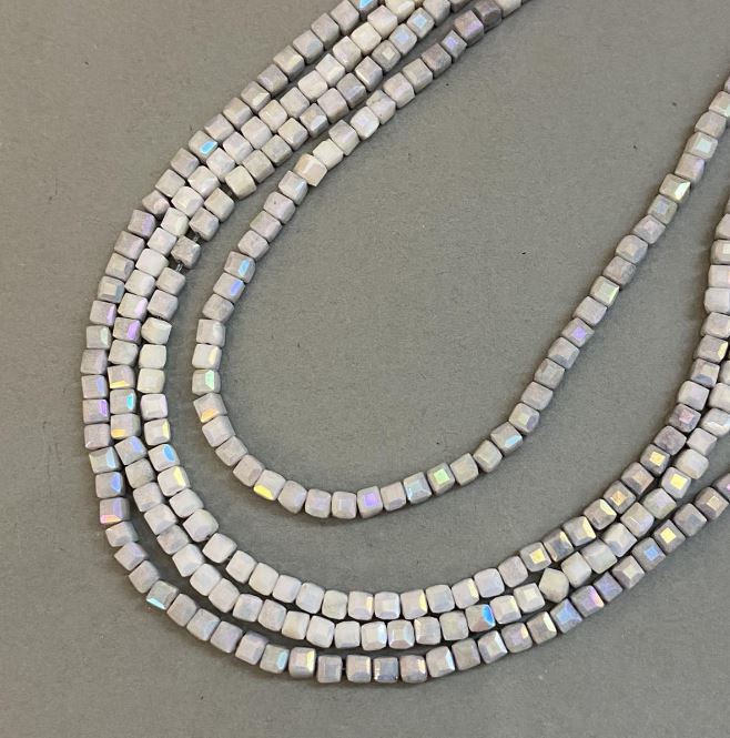 Beads Czech Crystal gray with gasoline finish on thread, faceted cube, diameter 4x4 mm, length 38 cm + -