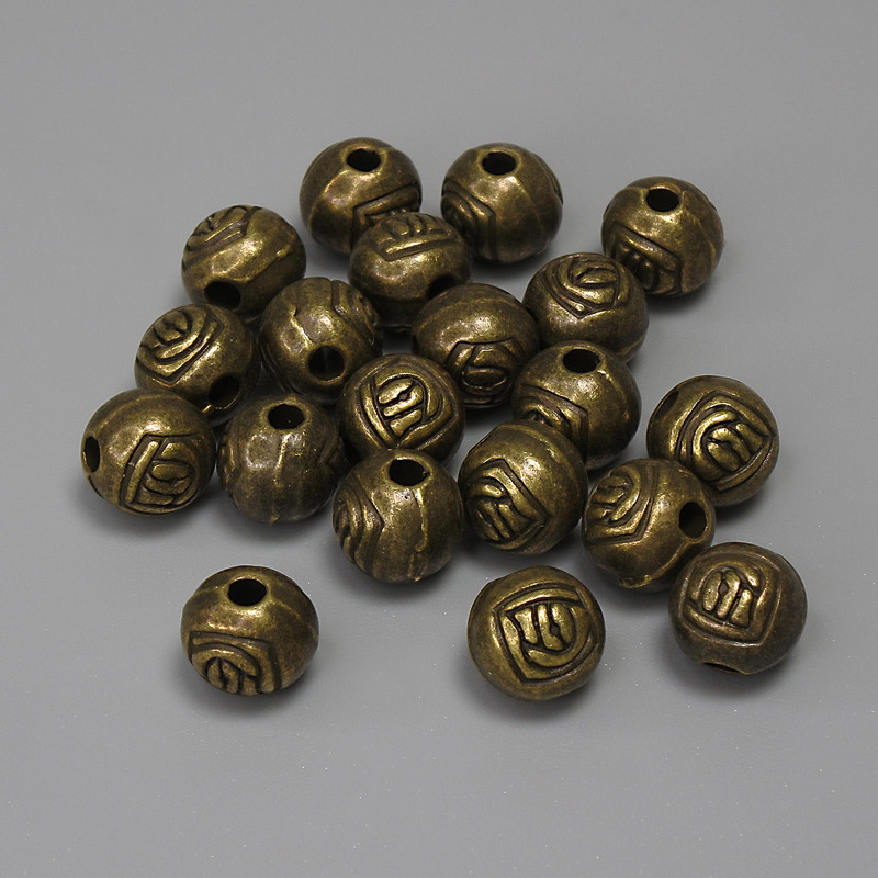 Bronze-colored bead insert findings, 6 mm diameter, hole diameter ~1.9 mm, packaging 19 pcs.