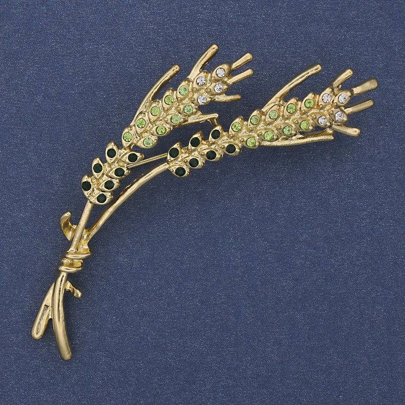 Brooch 'Wheat Ears' with green and white crystals on gold-tone metal 18x65mm+
