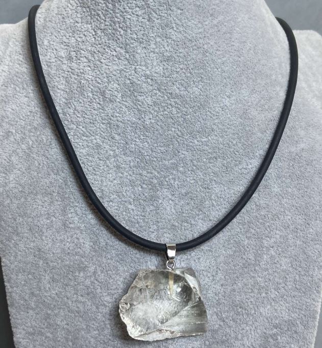 Pendant with Mountain Crystal Raw Stone 30x24-30 mm (±) Assorted Sizes on a Rubber Cord, Length 60 cm + 5 cm Chain