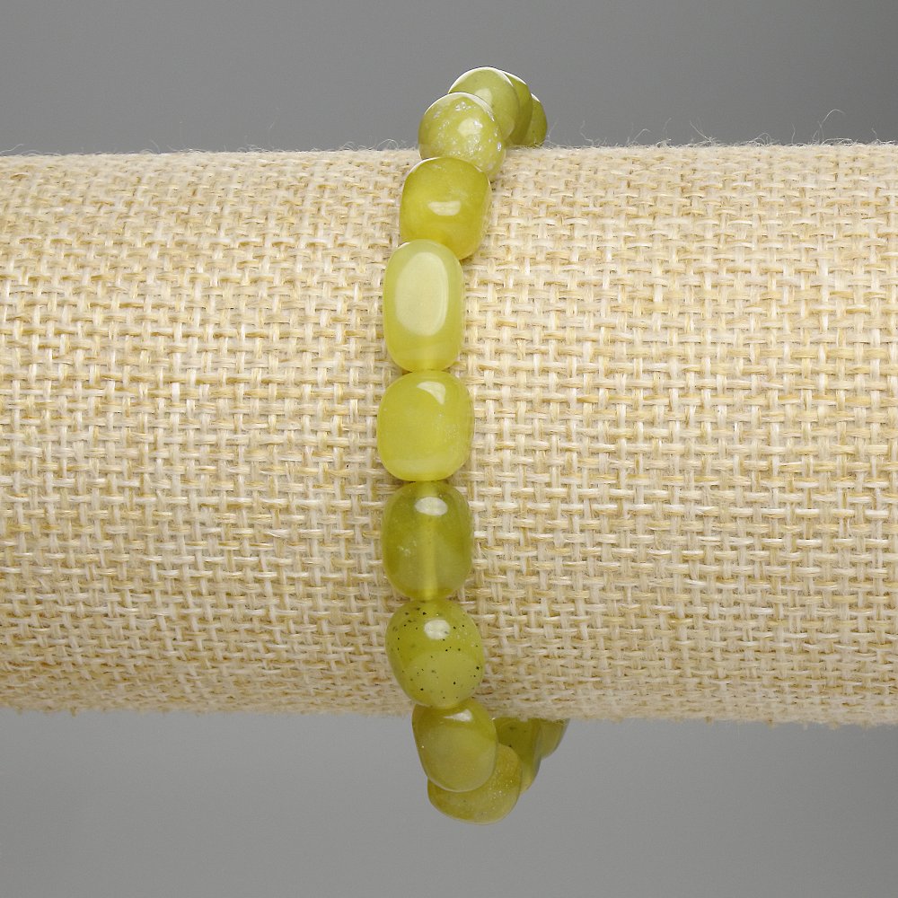 Jadeite faceted bracelet, bead diameter 9-12 × 8 mm, length 18 cm ± stretch