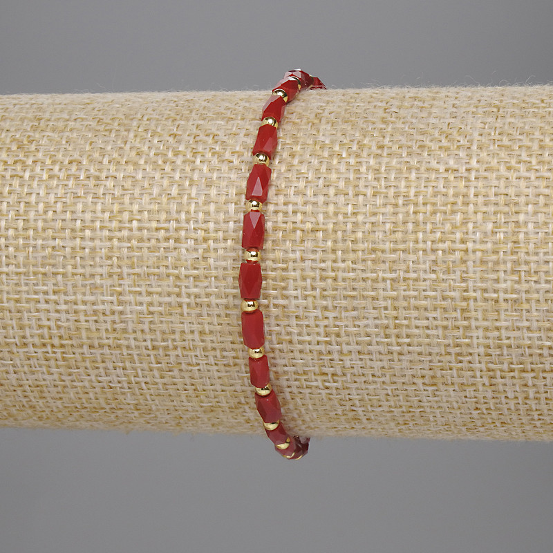 Red Czech crystal bracelet with faceted cylinders 5x3 mm and 2 mm beads, 18 cm stretch