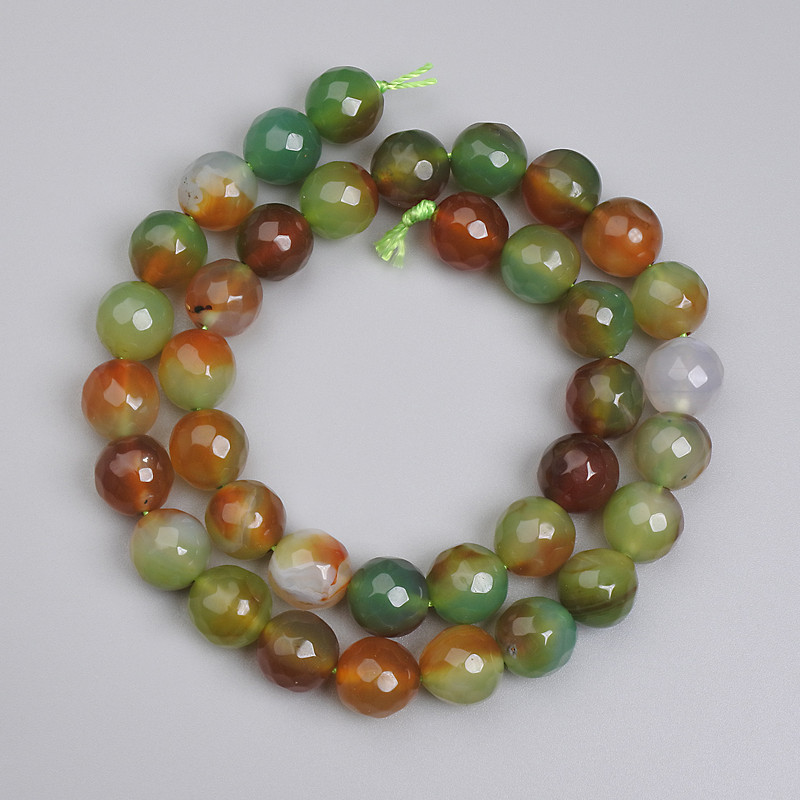 Beads of Brazilian Agate, faceted round beads, approximately 10mm diameter, approximately 36 cm length on thread