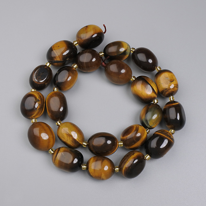 Tiger's Eye Beads, Faceted, 14–17×12–12.5 mm, with 5 mm+ beads and 3 mm+ seed beads on thread, length 40 cm+