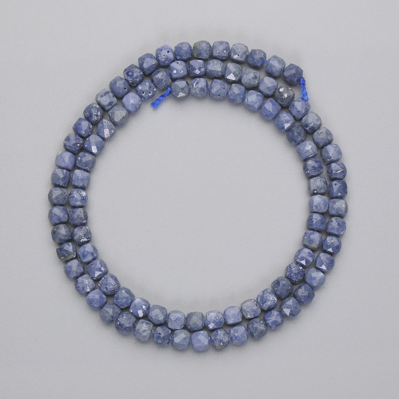 Sponge coral beads, faceted cube shape, 4x4 mm, 39 cm on beading thread